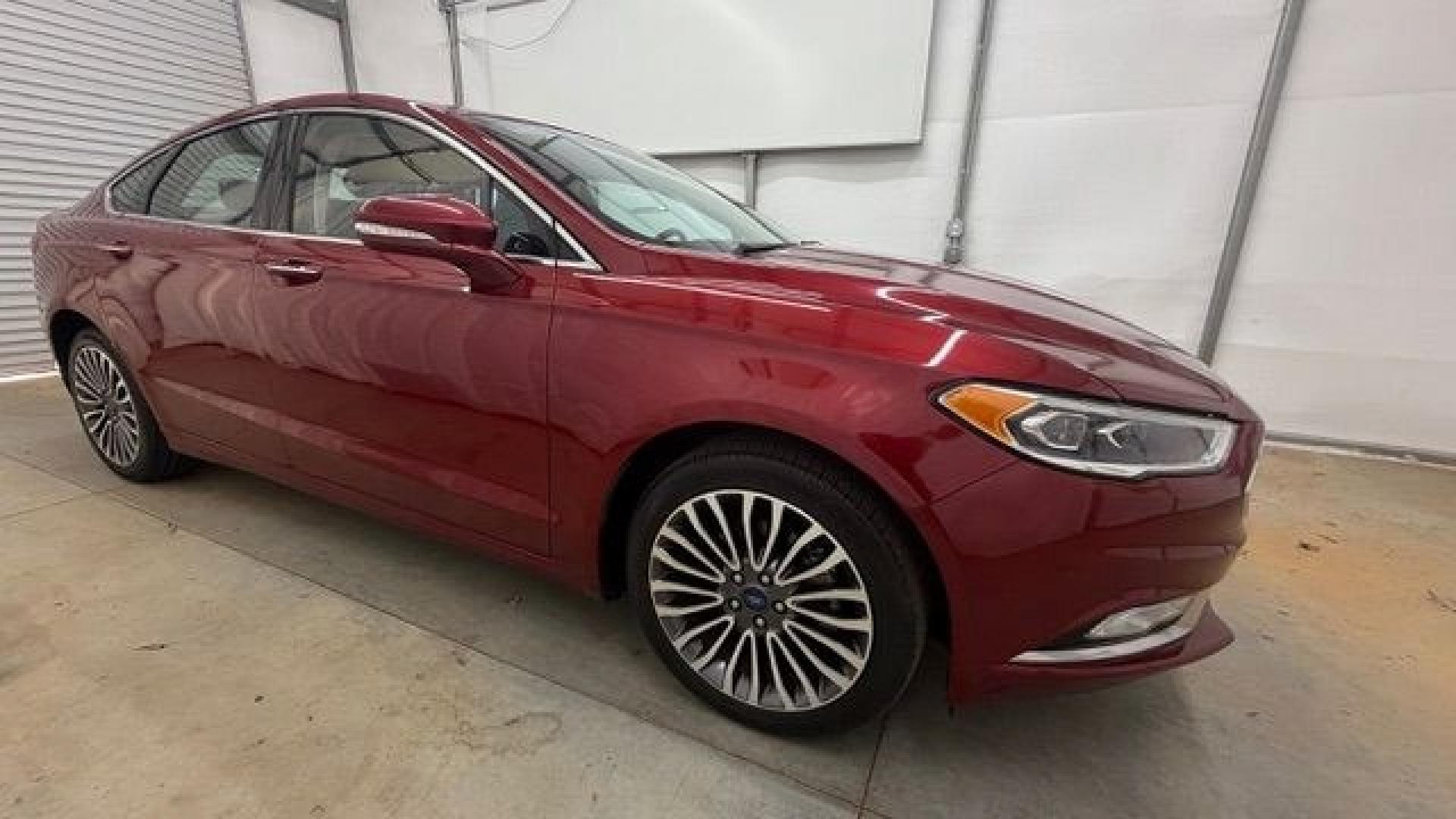 2017 Red Ford Fusion SE (3FA6P0T99HR) with an EcoBoost 2L I-4 gasoline direct injection engine, located at 1806 Veterans Memorial Hwy SW, Austell, GA, 30168, (770) 944-9558, 33.817959, -84.606987 - Photo#7