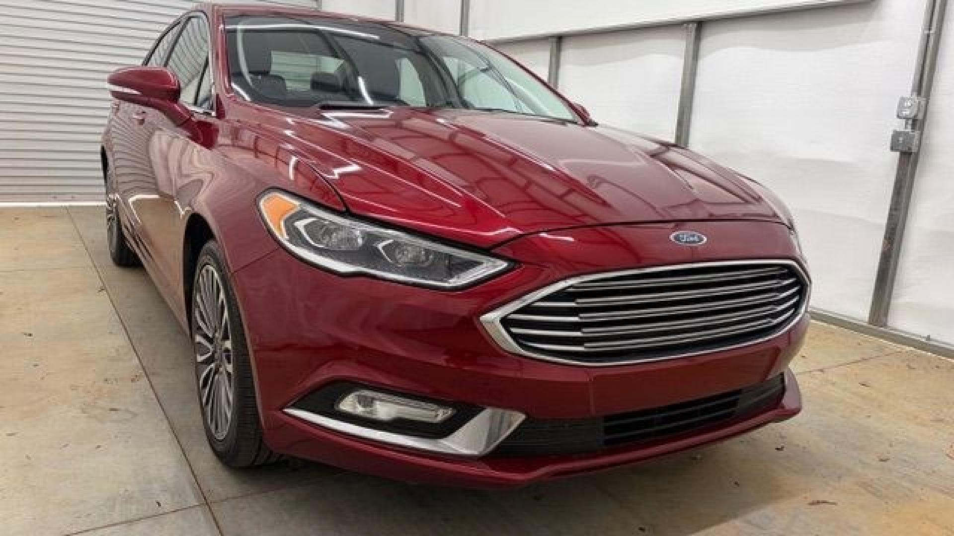 2017 Red Ford Fusion SE (3FA6P0T99HR) with an EcoBoost 2L I-4 gasoline direct injection engine, located at 1806 Veterans Memorial Hwy SW, Austell, GA, 30168, (770) 944-9558, 33.817959, -84.606987 - Photo#8