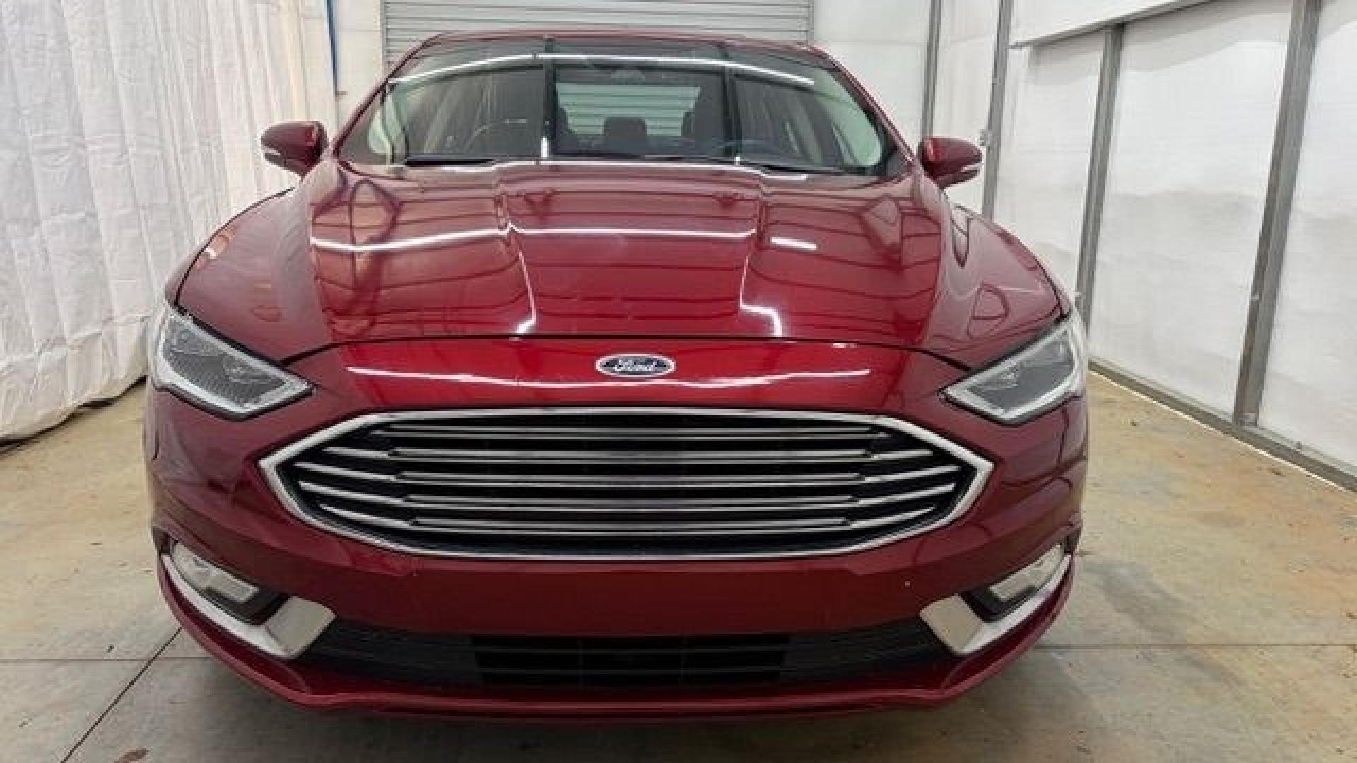 2017 Red Ford Fusion SE (3FA6P0T99HR) with an EcoBoost 2L I-4 gasoline direct injection engine, located at 1806 Veterans Memorial Hwy SW, Austell, GA, 30168, (770) 944-9558, 33.817959, -84.606987 - Photo#9