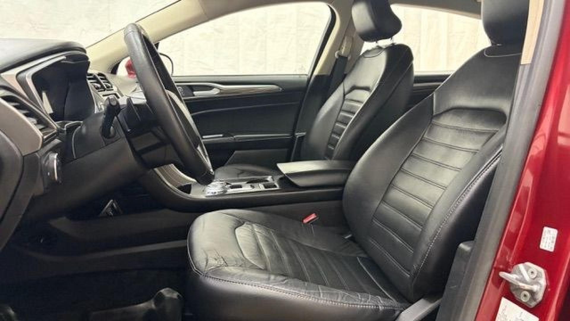 2017 Red Ford Fusion SE (3FA6P0T99HR) with an EcoBoost 2L I-4 gasoline direct injection engine, located at 1806 Veterans Memorial Hwy SW, Austell, GA, 30168, (770) 944-9558, 33.817959, -84.606987 - Photo#11