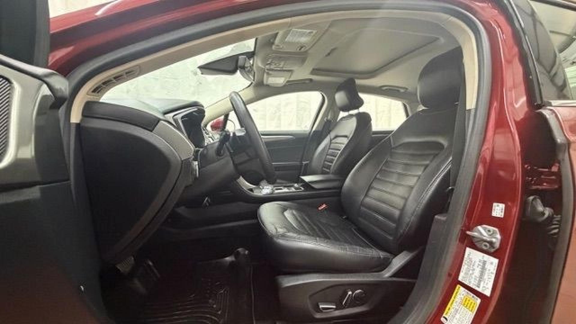 2017 Red Ford Fusion SE (3FA6P0T99HR) with an EcoBoost 2L I-4 gasoline direct injection engine, located at 1806 Veterans Memorial Hwy SW, Austell, GA, 30168, (770) 944-9558, 33.817959, -84.606987 - Photo#12