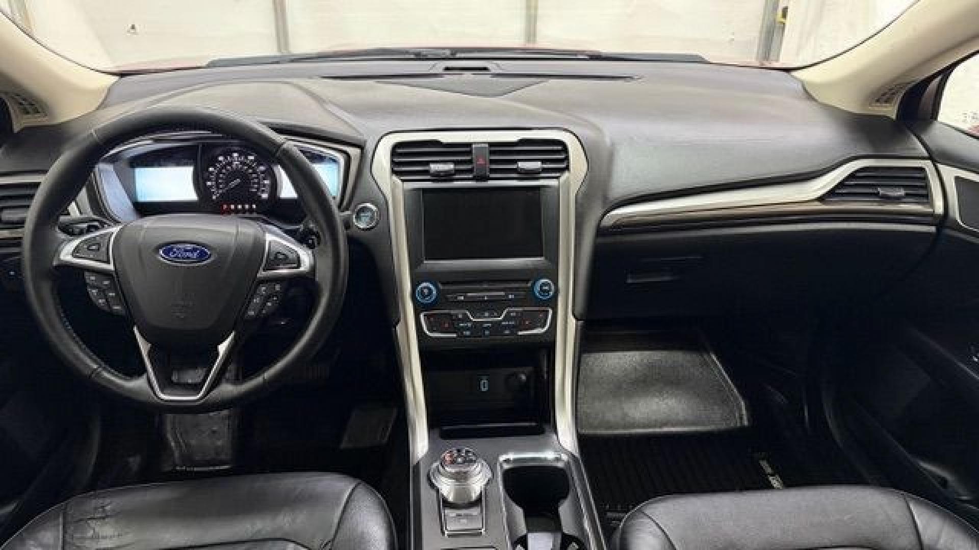 2017 Red Ford Fusion SE (3FA6P0T99HR) with an EcoBoost 2L I-4 gasoline direct injection engine, located at 1806 Veterans Memorial Hwy SW, Austell, GA, 30168, (770) 944-9558, 33.817959, -84.606987 - Photo#15