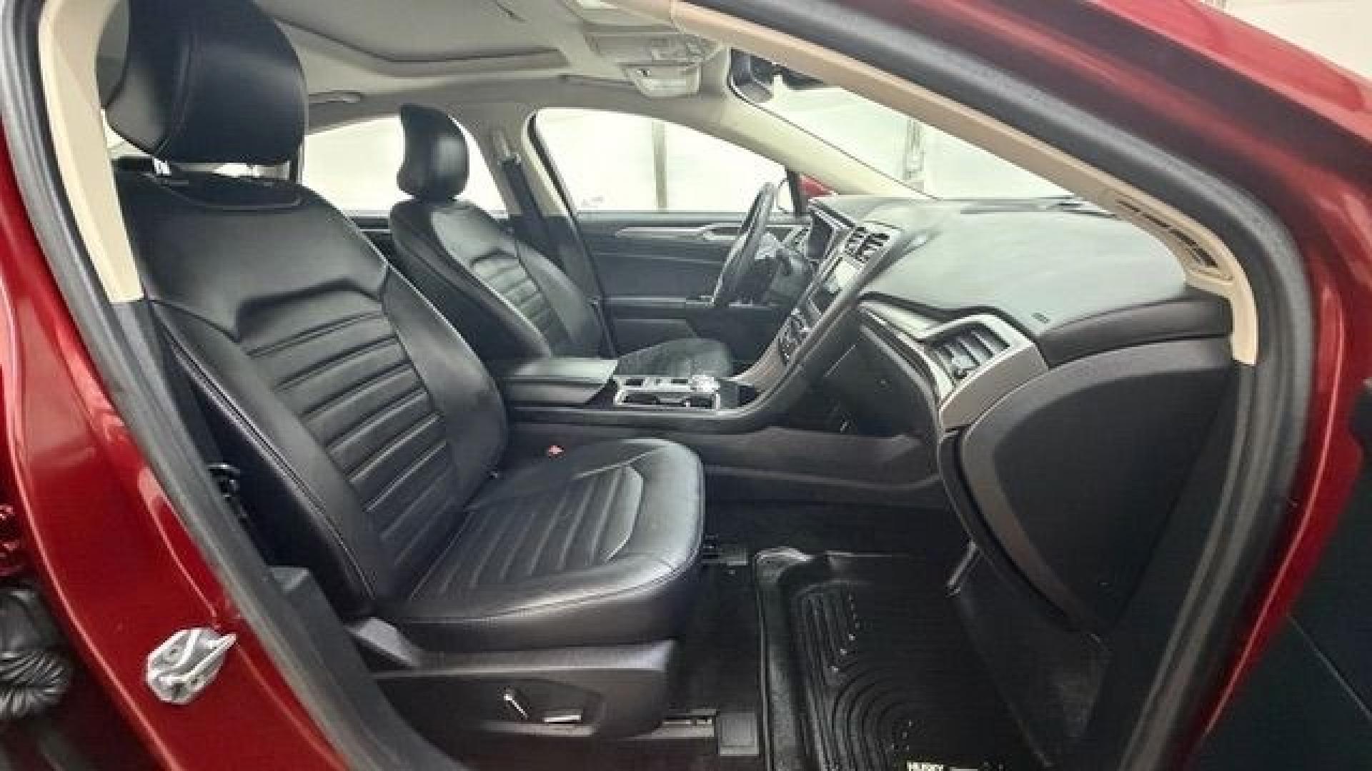 2017 Red Ford Fusion SE (3FA6P0T99HR) with an EcoBoost 2L I-4 gasoline direct injection engine, located at 1806 Veterans Memorial Hwy SW, Austell, GA, 30168, (770) 944-9558, 33.817959, -84.606987 - Photo#17