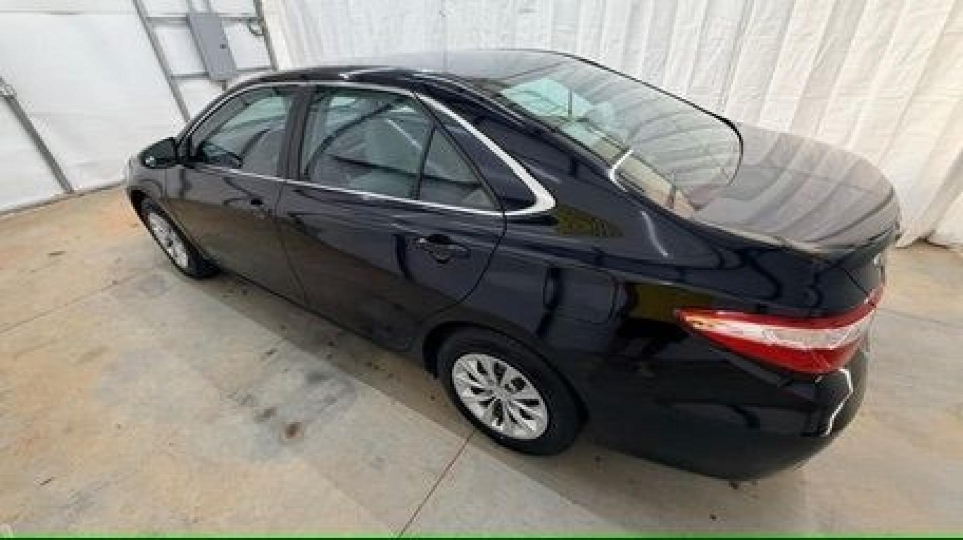 2016 Black Toyota Camry LE (4T1BF1FK5GU) with an 2.5L I-4 DOHC engine, located at 1806 Veterans Memorial Hwy SW, Austell, GA, 30168, (770) 944-9558, 33.817959, -84.606987- Photo#2
