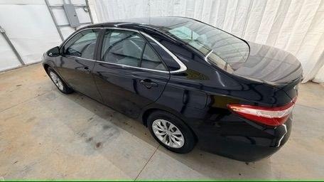 2016 Black Toyota Camry LE (4T1BF1FK5GU) with an 2.5L I-4 DOHC engine, located at 1806 Veterans Memorial Hwy SW, Austell, GA, 30168, (770) 944-9558, 33.817959, -84.606987 - Photo#2