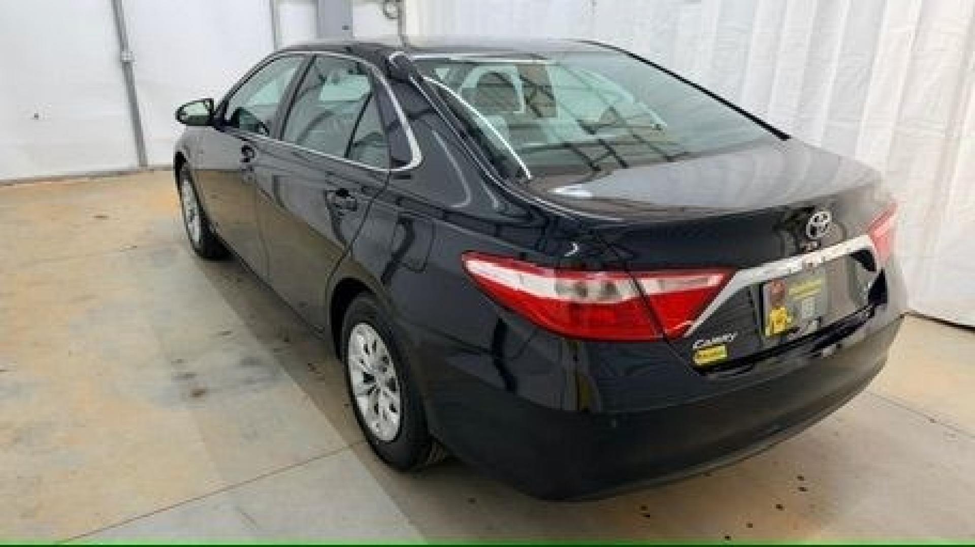 2016 Black Toyota Camry LE (4T1BF1FK5GU) with an 2.5L I-4 DOHC engine, located at 1806 Veterans Memorial Hwy SW, Austell, GA, 30168, (770) 944-9558, 33.817959, -84.606987- Photo#3
