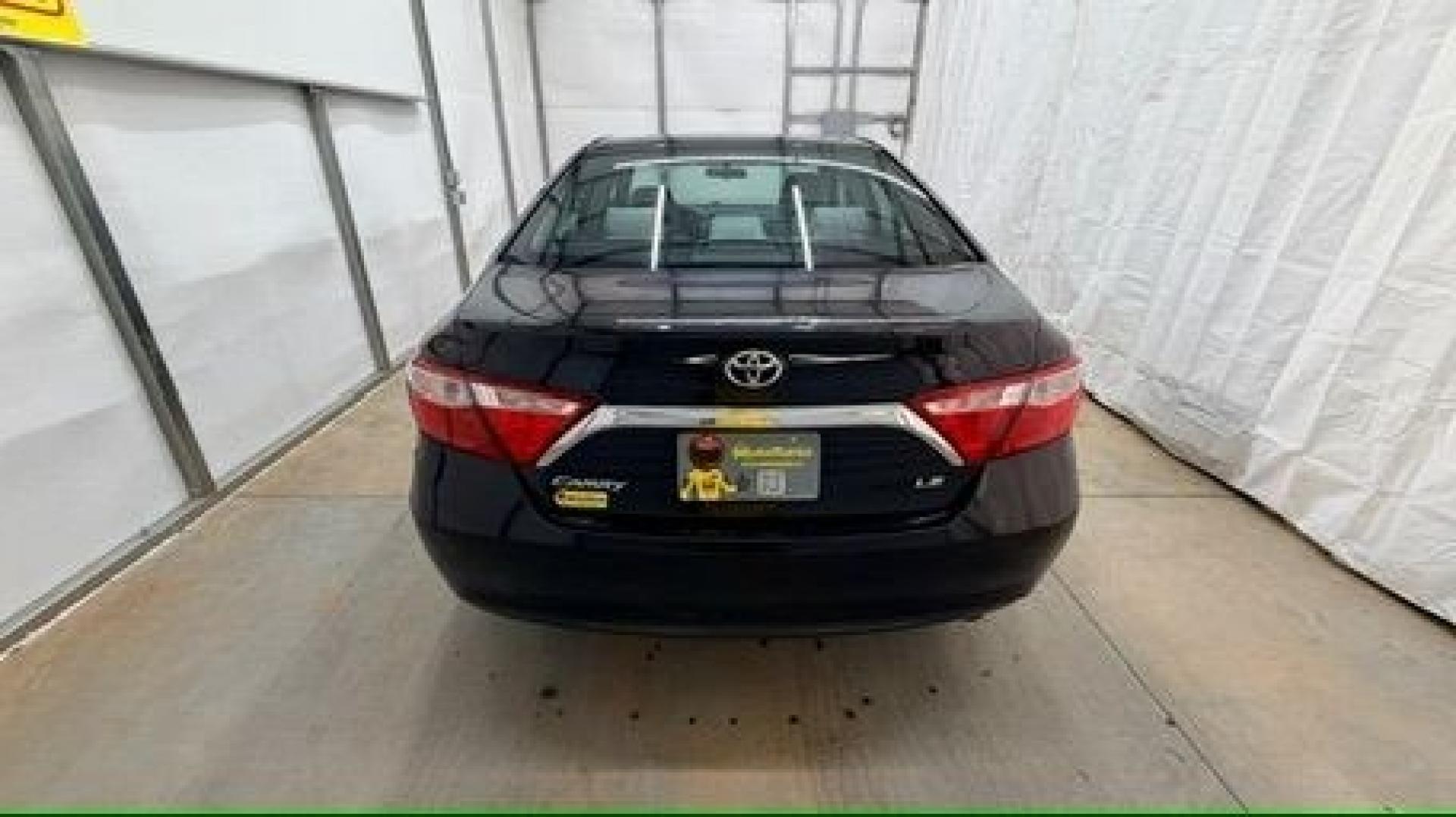 2016 Black Toyota Camry LE (4T1BF1FK5GU) with an 2.5L I-4 DOHC engine, located at 1806 Veterans Memorial Hwy SW, Austell, GA, 30168, (770) 944-9558, 33.817959, -84.606987- Photo#4