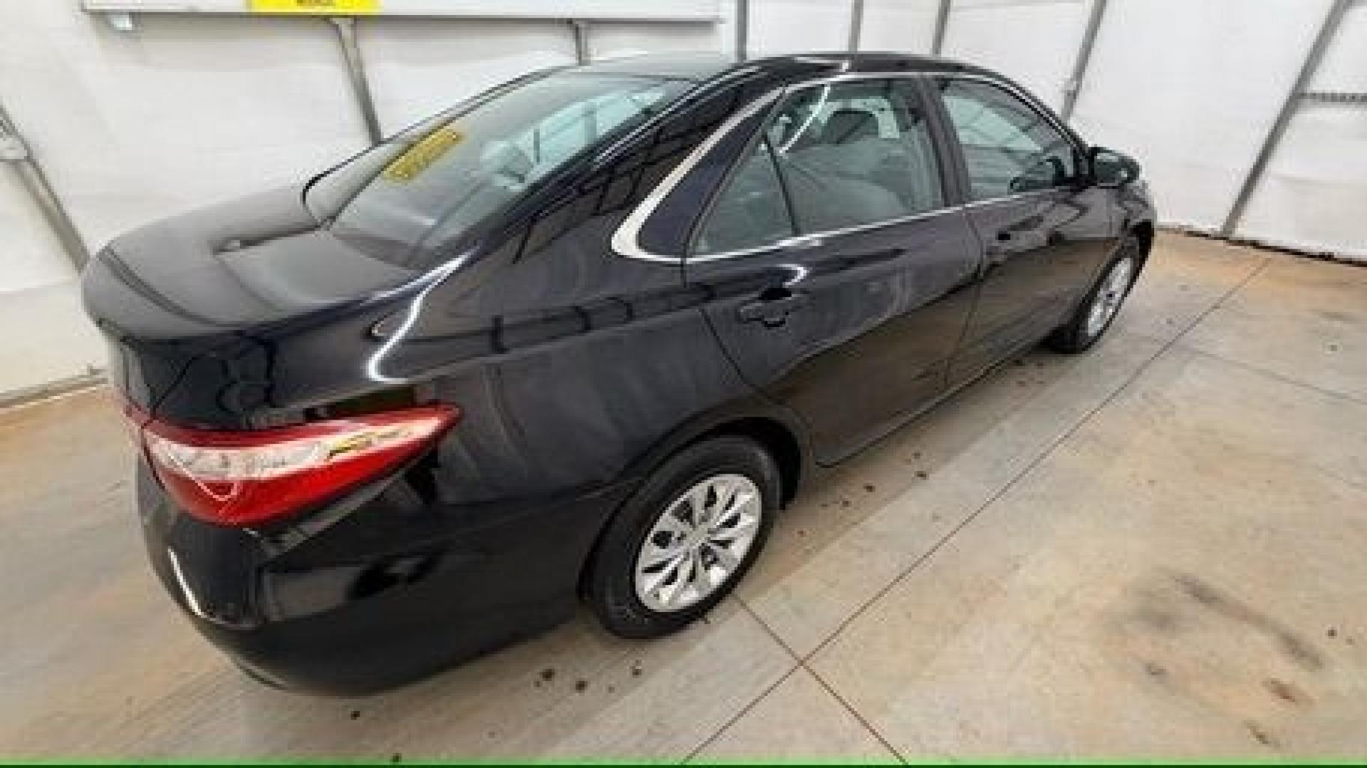 2016 Black Toyota Camry LE (4T1BF1FK5GU) with an 2.5L I-4 DOHC engine, located at 1806 Veterans Memorial Hwy SW, Austell, GA, 30168, (770) 944-9558, 33.817959, -84.606987- Photo#6