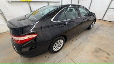 2016 Black Toyota Camry LE (4T1BF1FK5GU) with an 2.5L I-4 DOHC engine, located at 1806 Veterans Memorial Hwy SW, Austell, GA, 30168, (770) 944-9558, 33.817959, -84.606987 - Photo#6