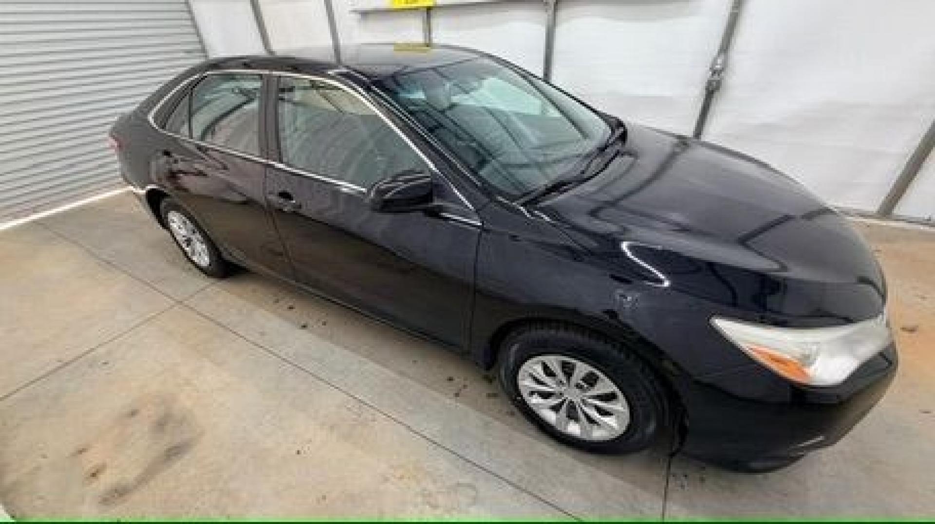 2016 Black Toyota Camry LE (4T1BF1FK5GU) with an 2.5L I-4 DOHC engine, located at 1806 Veterans Memorial Hwy SW, Austell, GA, 30168, (770) 944-9558, 33.817959, -84.606987- Photo#7