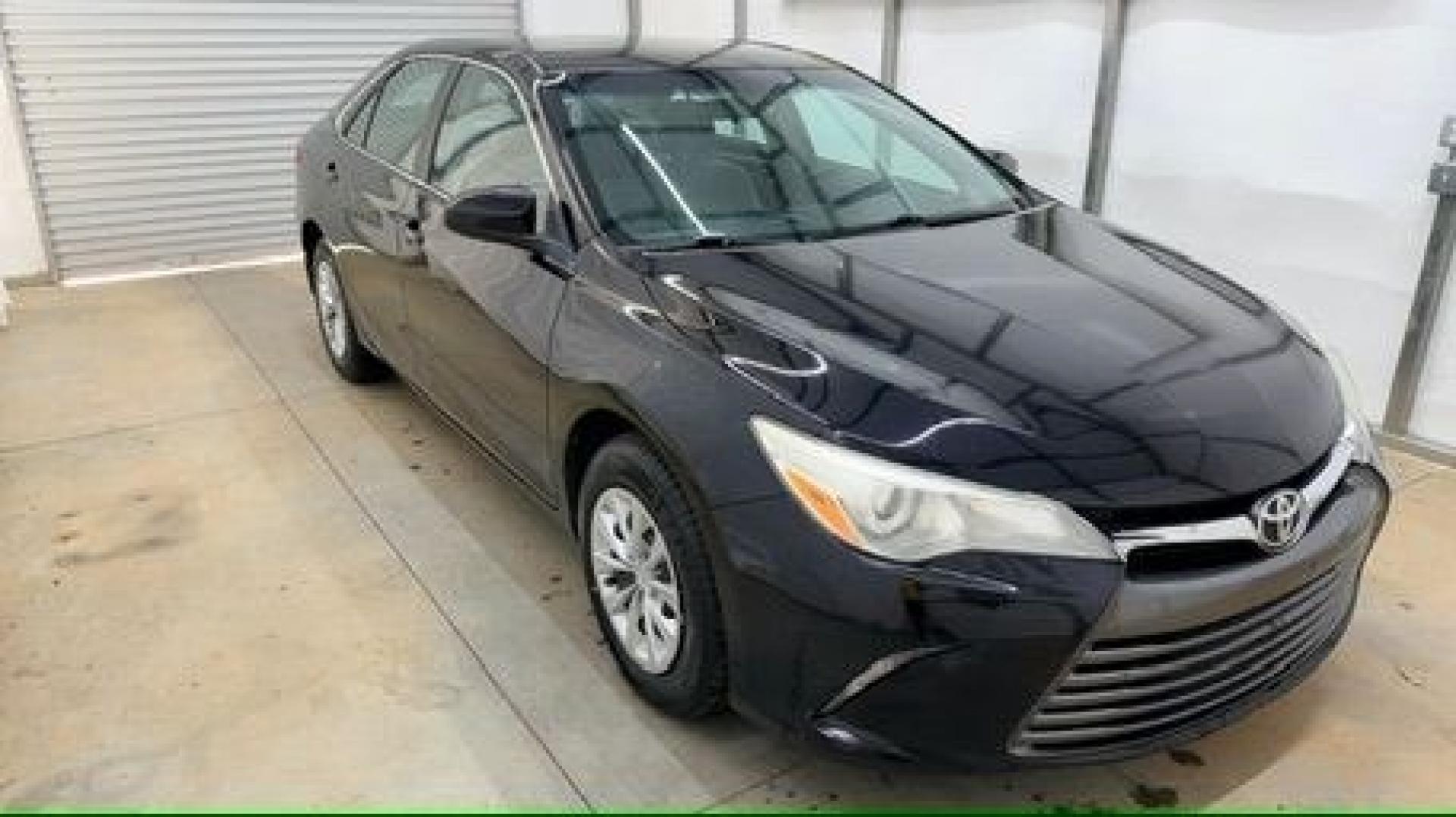 2016 Black Toyota Camry LE (4T1BF1FK5GU) with an 2.5L I-4 DOHC engine, located at 1806 Veterans Memorial Hwy SW, Austell, GA, 30168, (770) 944-9558, 33.817959, -84.606987- Photo#8
