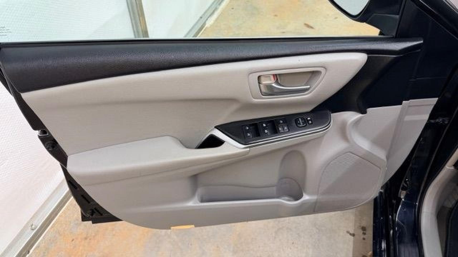 2016 Black Toyota Camry LE (4T1BF1FK5GU) with an 2.5L I-4 DOHC engine, located at 1806 Veterans Memorial Hwy SW, Austell, GA, 30168, (770) 944-9558, 33.817959, -84.606987- Photo#10