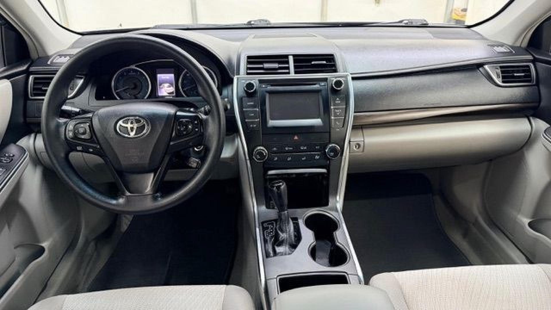 2016 Black Toyota Camry LE (4T1BF1FK5GU) with an 2.5L I-4 DOHC engine, located at 1806 Veterans Memorial Hwy SW, Austell, GA, 30168, (770) 944-9558, 33.817959, -84.606987- Photo#14