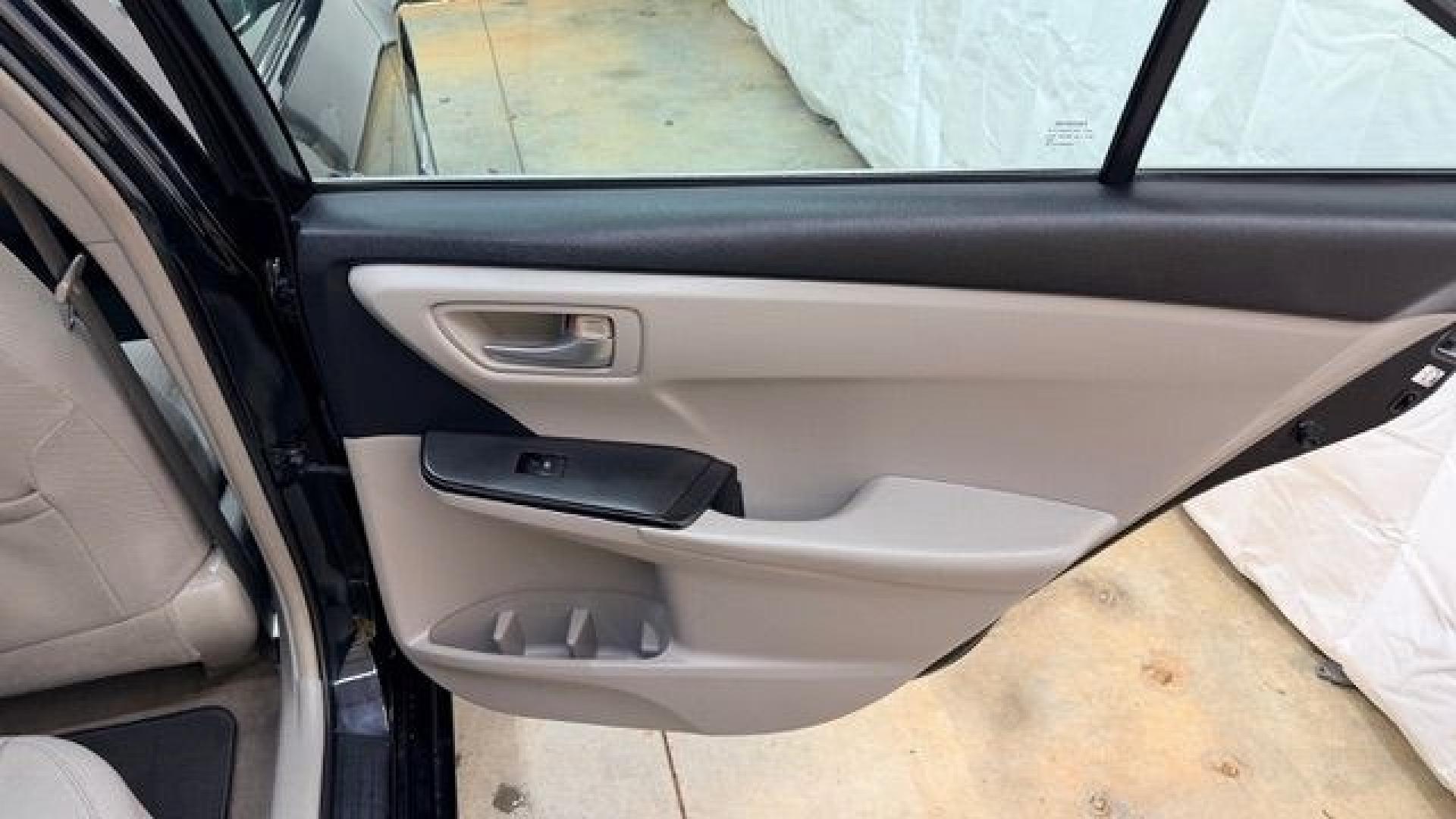2016 Black Toyota Camry LE (4T1BF1FK5GU) with an 2.5L I-4 DOHC engine, located at 1806 Veterans Memorial Hwy SW, Austell, GA, 30168, (770) 944-9558, 33.817959, -84.606987- Photo#15
