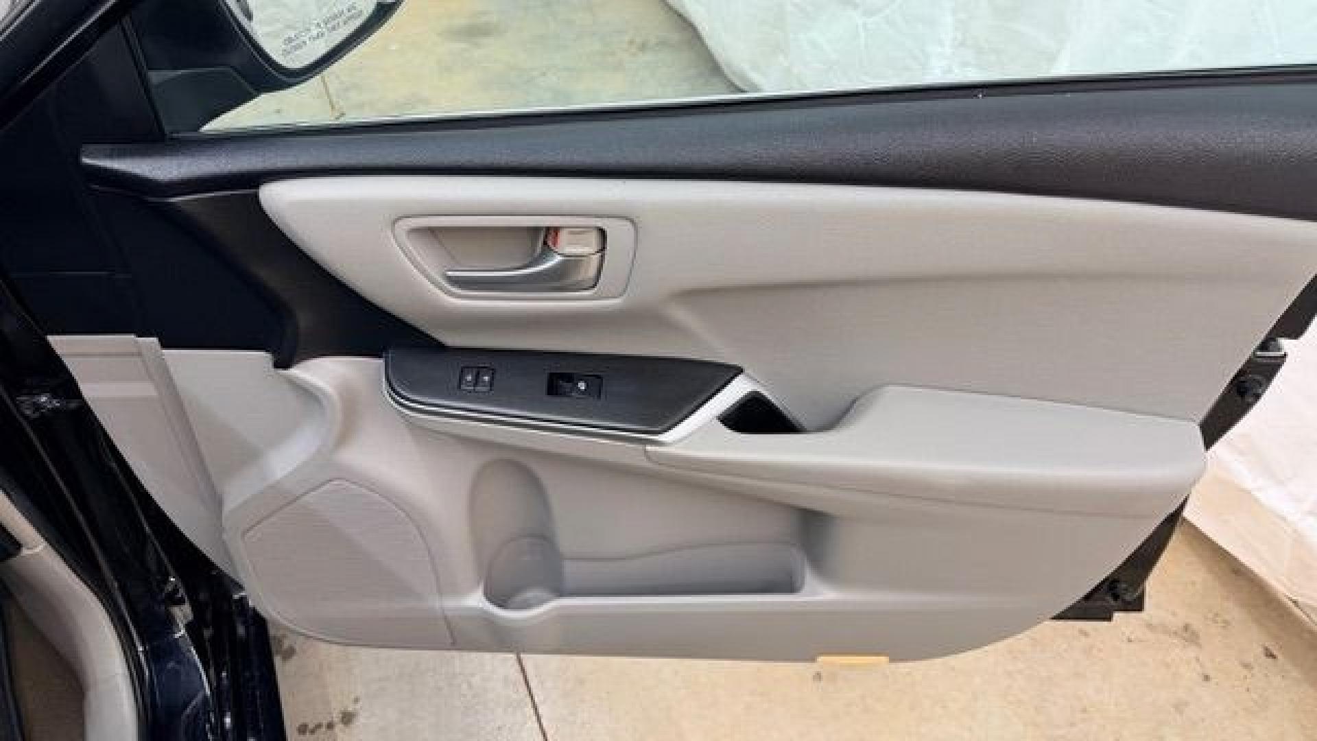2016 Black Toyota Camry LE (4T1BF1FK5GU) with an 2.5L I-4 DOHC engine, located at 1806 Veterans Memorial Hwy SW, Austell, GA, 30168, (770) 944-9558, 33.817959, -84.606987- Photo#17