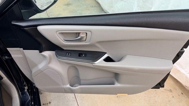 2016 Black Toyota Camry LE (4T1BF1FK5GU) with an 2.5L I-4 DOHC engine, located at 1806 Veterans Memorial Hwy SW, Austell, GA, 30168, (770) 944-9558, 33.817959, -84.606987 - Photo#17