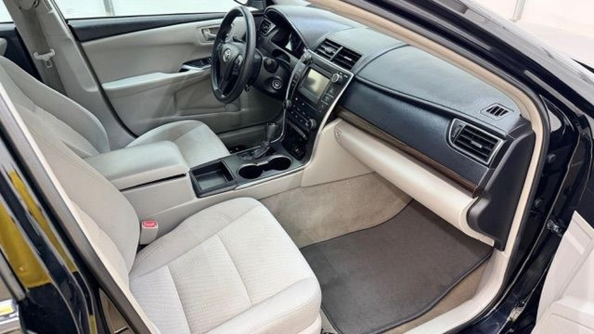 2016 Black Toyota Camry LE (4T1BF1FK5GU) with an 2.5L I-4 DOHC engine, located at 1806 Veterans Memorial Hwy SW, Austell, GA, 30168, (770) 944-9558, 33.817959, -84.606987- Photo#18