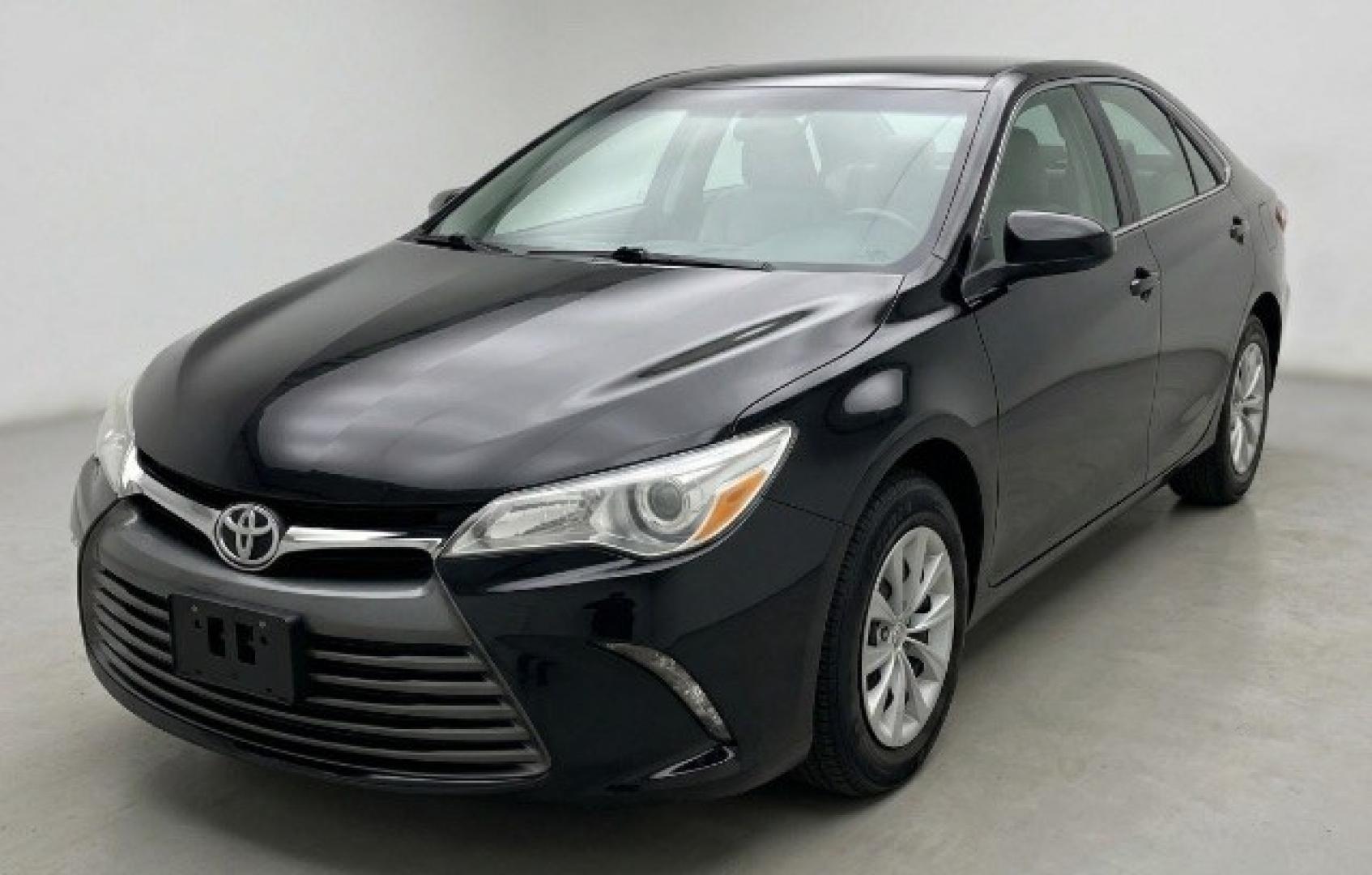 2016 Black Toyota Camry LE (4T1BF1FK5GU) with an 2.5L I-4 DOHC engine, located at 1806 Veterans Memorial Hwy SW, Austell, GA, 30168, (770) 944-9558, 33.817959, -84.606987- Photo#0