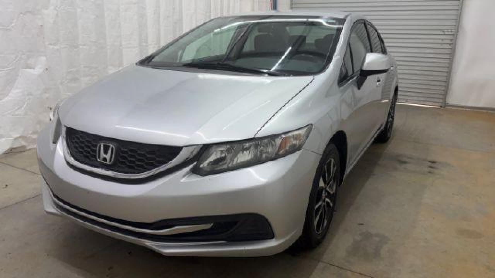 2013 Silver Honda Civic LX (2HGFB2F57DH) with an 1.8L I-4 i-VTEC variable valve control engine, located at 1806 Veterans Memorial Hwy SW, Austell, GA, 30168, (770) 944-9558, 33.817959, -84.606987- Photo#0