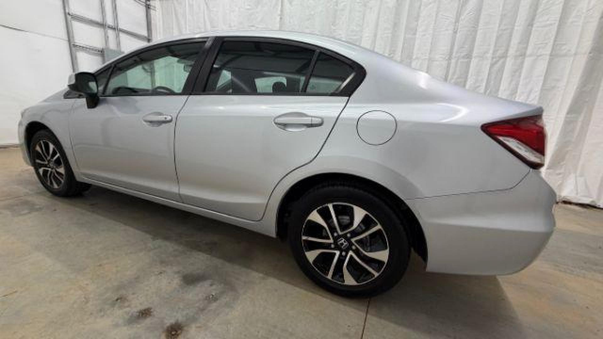 2013 Silver Honda Civic LX (2HGFB2F57DH) with an 1.8L I-4 i-VTEC variable valve control engine, located at 1806 Veterans Memorial Hwy SW, Austell, GA, 30168, (770) 944-9558, 33.817959, -84.606987- Photo#2