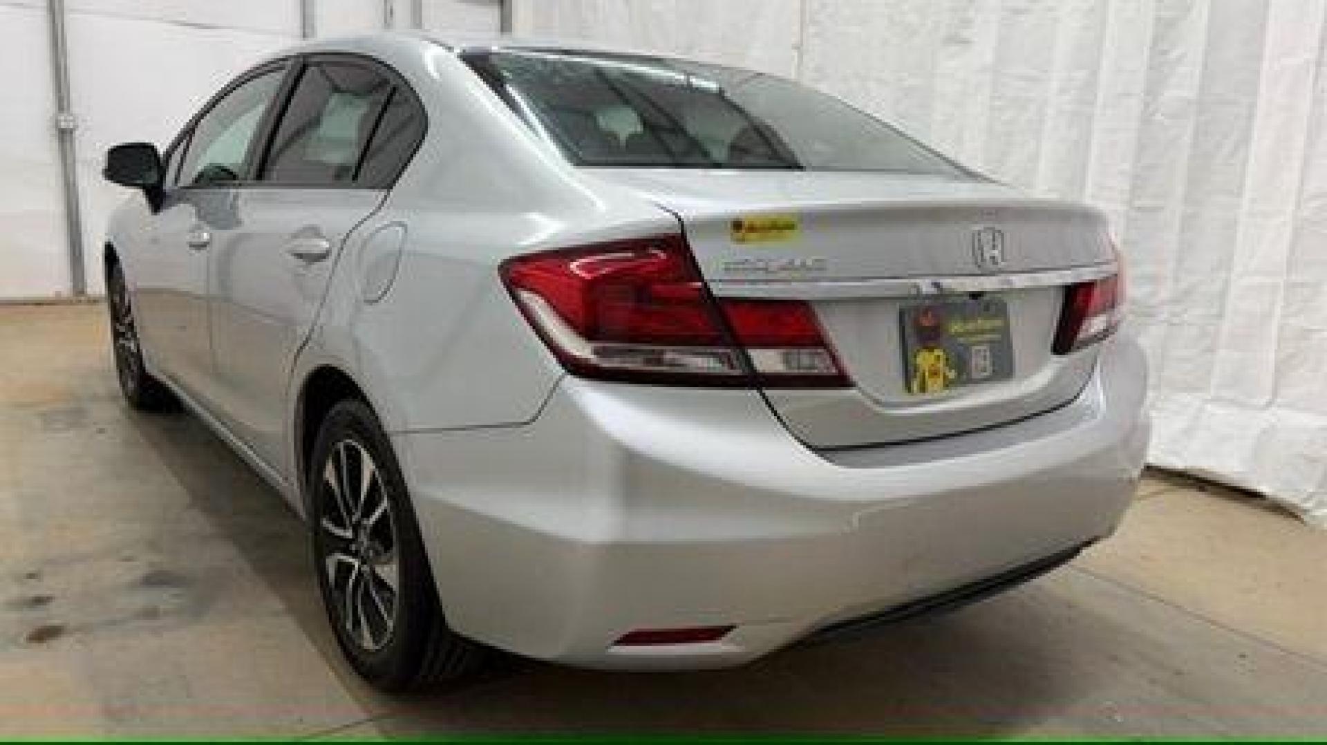 2013 Silver Honda Civic LX (2HGFB2F57DH) with an 1.8L I-4 i-VTEC variable valve control engine, located at 1806 Veterans Memorial Hwy SW, Austell, GA, 30168, (770) 944-9558, 33.817959, -84.606987- Photo#3