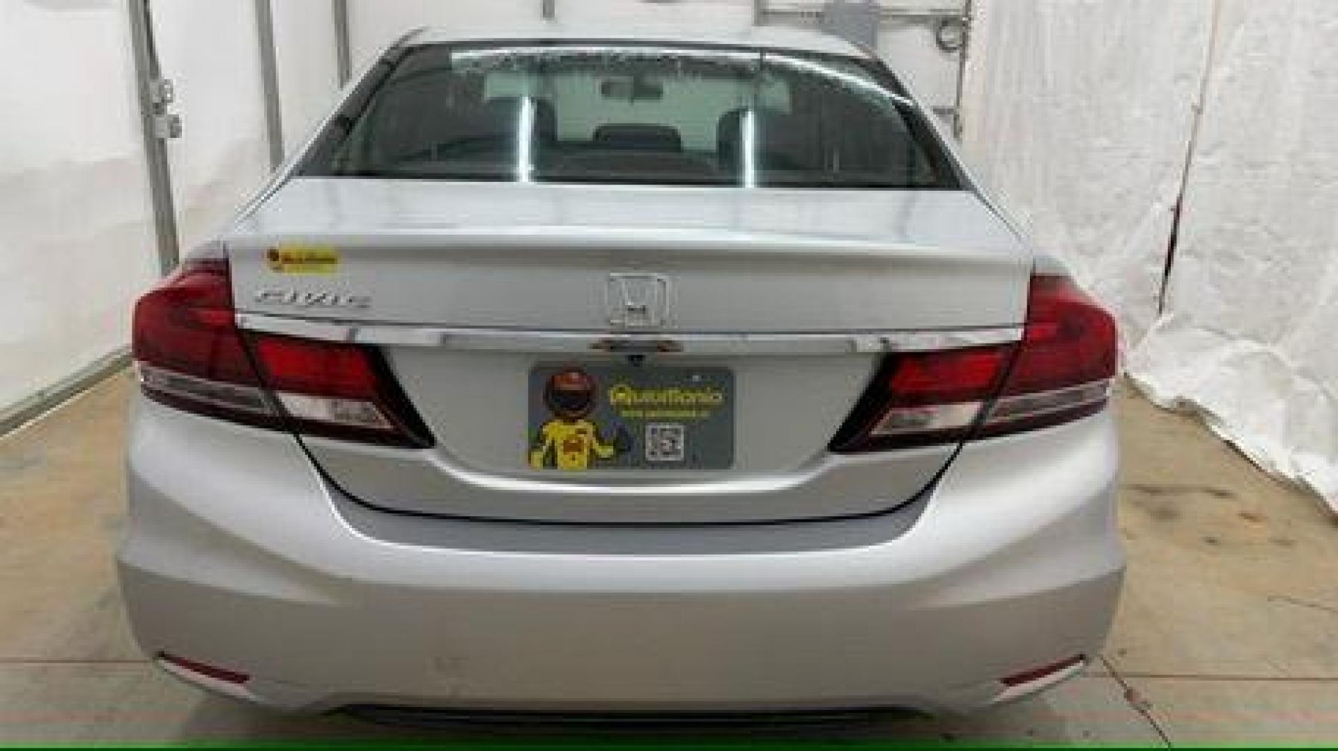 2013 Silver Honda Civic LX (2HGFB2F57DH) with an 1.8L I-4 i-VTEC variable valve control engine, located at 1806 Veterans Memorial Hwy SW, Austell, GA, 30168, (770) 944-9558, 33.817959, -84.606987- Photo#4