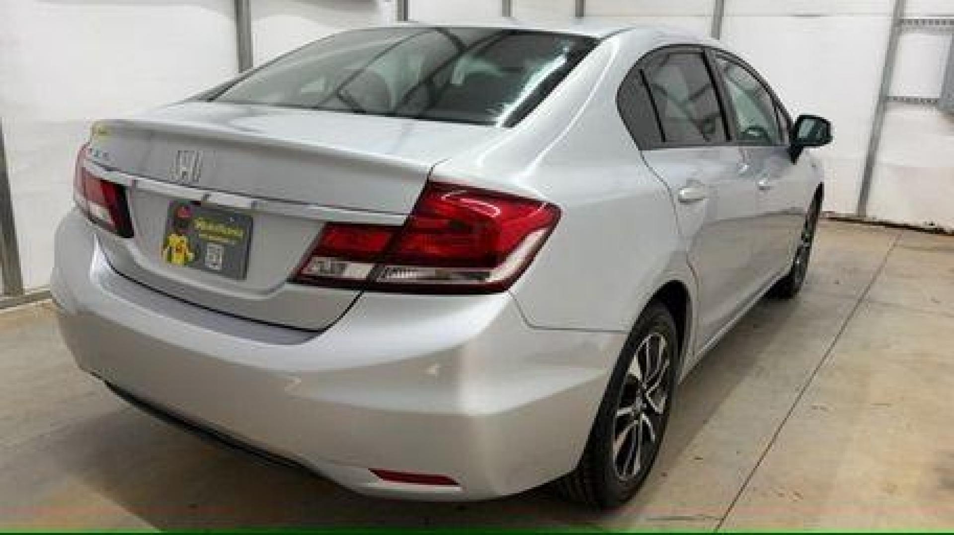 2013 Silver Honda Civic LX (2HGFB2F57DH) with an 1.8L I-4 i-VTEC variable valve control engine, located at 1806 Veterans Memorial Hwy SW, Austell, GA, 30168, (770) 944-9558, 33.817959, -84.606987- Photo#5