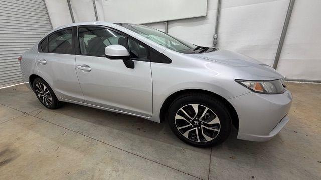 2013 Silver Honda Civic LX (2HGFB2F57DH) with an 1.8L I-4 i-VTEC variable valve control engine, located at 1806 Veterans Memorial Hwy SW, Austell, GA, 30168, (770) 944-9558, 33.817959, -84.606987 - Photo#7