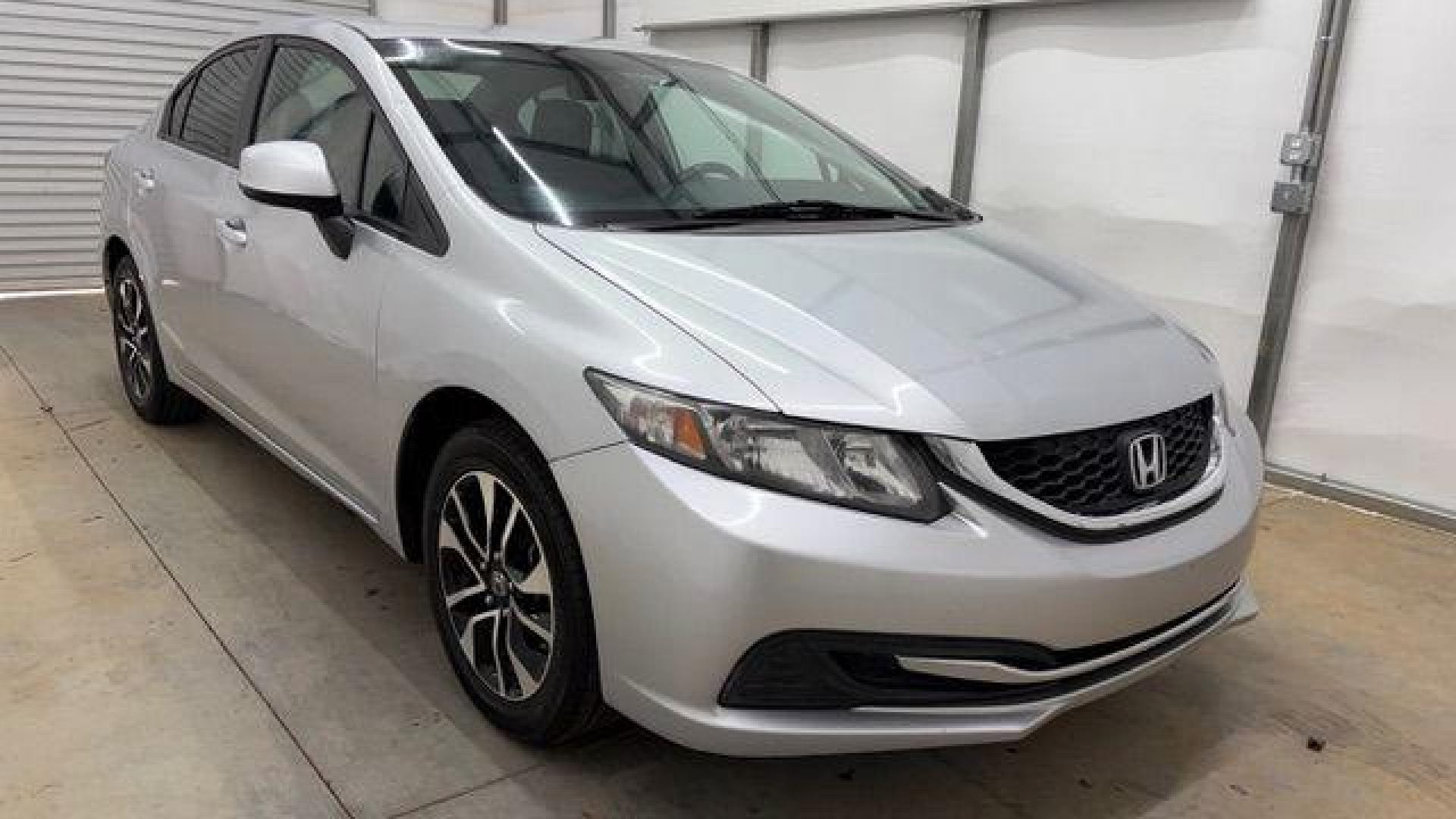 2013 Silver Honda Civic LX (2HGFB2F57DH) with an 1.8L I-4 i-VTEC variable valve control engine, located at 1806 Veterans Memorial Hwy SW, Austell, GA, 30168, (770) 944-9558, 33.817959, -84.606987- Photo#8