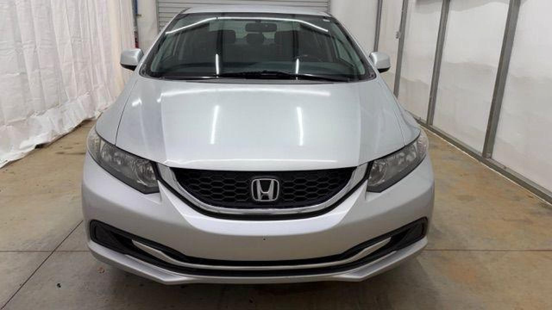 2013 Silver Honda Civic LX (2HGFB2F57DH) with an 1.8L I-4 i-VTEC variable valve control engine, located at 1806 Veterans Memorial Hwy SW, Austell, GA, 30168, (770) 944-9558, 33.817959, -84.606987- Photo#9