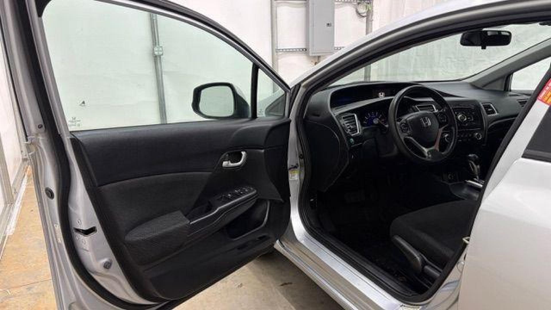 2013 Silver Honda Civic LX (2HGFB2F57DH) with an 1.8L I-4 i-VTEC variable valve control engine, located at 1806 Veterans Memorial Hwy SW, Austell, GA, 30168, (770) 944-9558, 33.817959, -84.606987- Photo#10