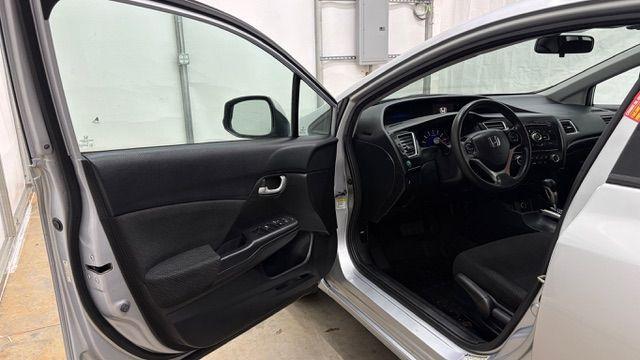 2013 Silver Honda Civic LX (2HGFB2F57DH) with an 1.8L I-4 i-VTEC variable valve control engine, located at 1806 Veterans Memorial Hwy SW, Austell, GA, 30168, (770) 944-9558, 33.817959, -84.606987 - Photo#10