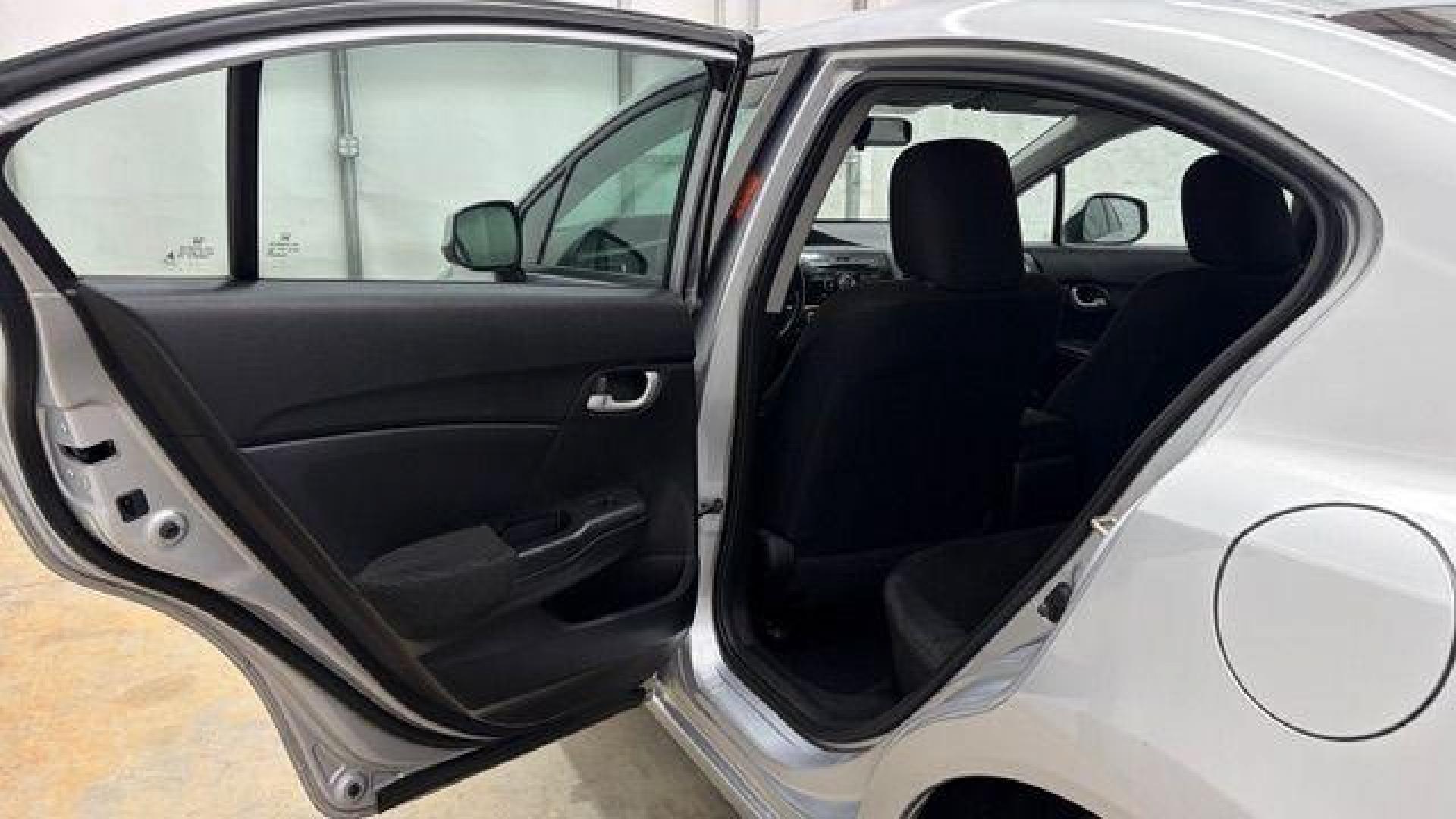 2013 Silver Honda Civic LX (2HGFB2F57DH) with an 1.8L I-4 i-VTEC variable valve control engine, located at 1806 Veterans Memorial Hwy SW, Austell, GA, 30168, (770) 944-9558, 33.817959, -84.606987- Photo#13