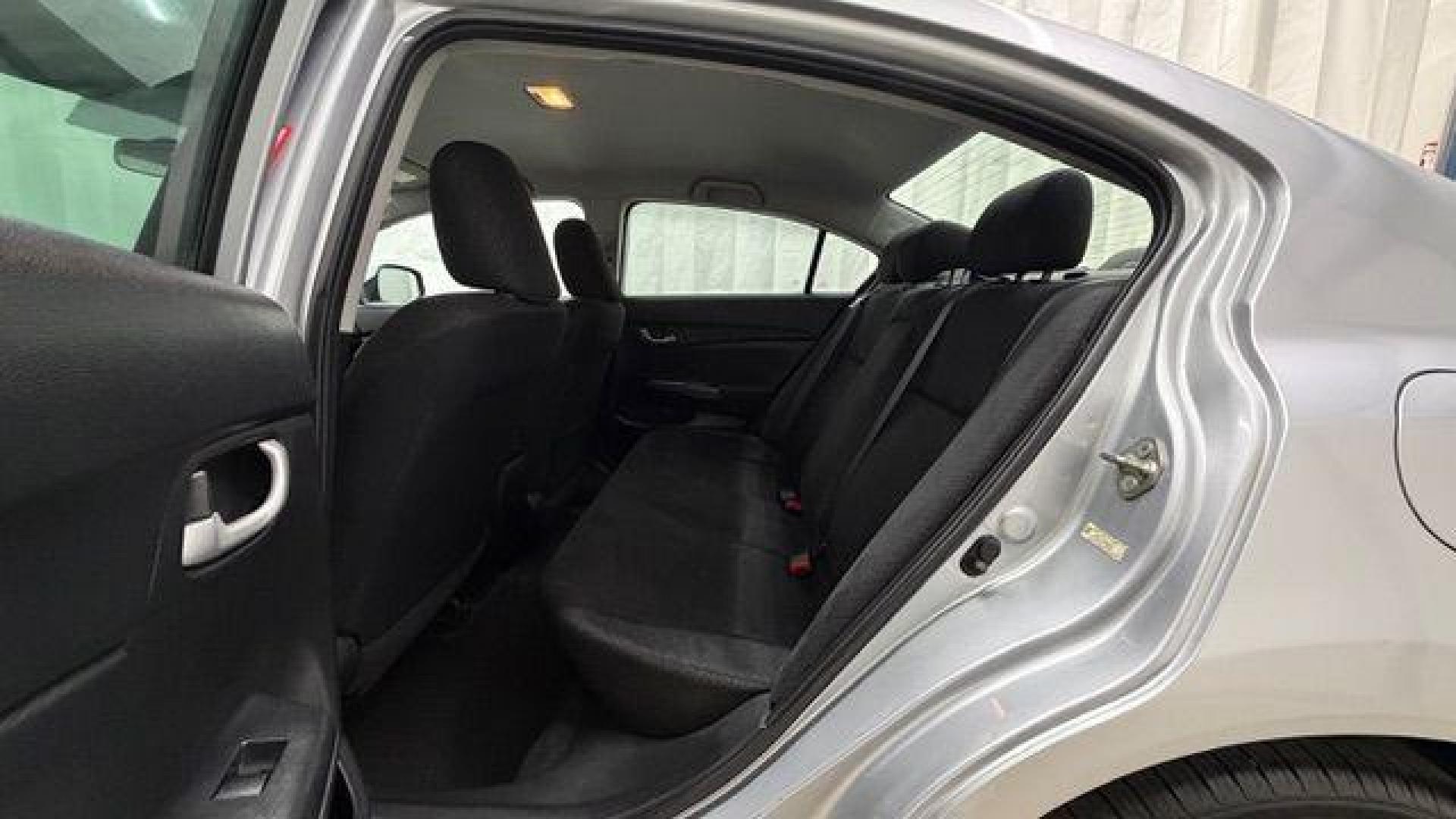 2013 Silver Honda Civic LX (2HGFB2F57DH) with an 1.8L I-4 i-VTEC variable valve control engine, located at 1806 Veterans Memorial Hwy SW, Austell, GA, 30168, (770) 944-9558, 33.817959, -84.606987- Photo#14