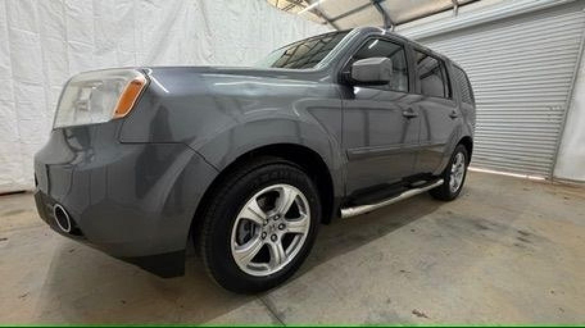 2012 Gray Honda Pilot EX-L (5FNYF3H52CB) with an 3.5L V-6 i-VTEC VCM variable valve control engine, located at 1806 Veterans Memorial Hwy SW, Austell, GA, 30168, (770) 944-9558, 33.817959, -84.606987- Photo#1