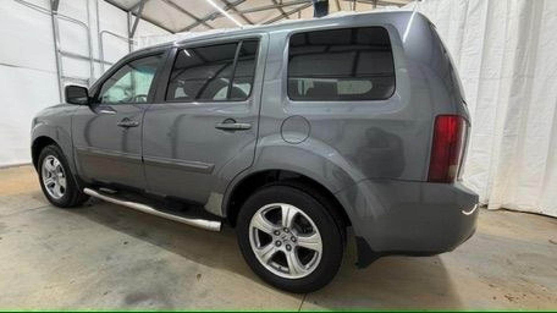 2012 Gray Honda Pilot EX-L (5FNYF3H52CB) with an 3.5L V-6 i-VTEC VCM variable valve control engine, located at 1806 Veterans Memorial Hwy SW, Austell, GA, 30168, (770) 944-9558, 33.817959, -84.606987- Photo#2