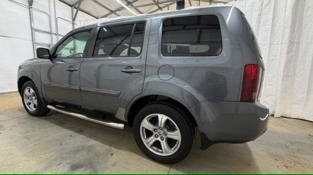2012 Gray Honda Pilot EX-L (5FNYF3H52CB) with an 3.5L V-6 i-VTEC VCM variable valve control engine, located at 1806 Veterans Memorial Hwy SW, Austell, GA, 30168, (770) 944-9558, 33.817959, -84.606987 - Photo#2