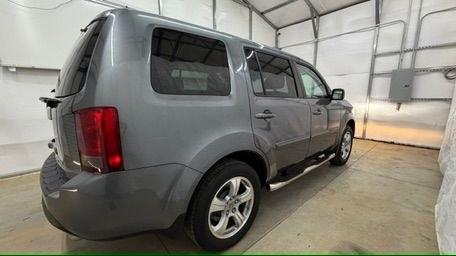 2012 Gray Honda Pilot EX-L (5FNYF3H52CB) with an 3.5L V-6 i-VTEC VCM variable valve control engine, located at 1806 Veterans Memorial Hwy SW, Austell, GA, 30168, (770) 944-9558, 33.817959, -84.606987 - Photo#6