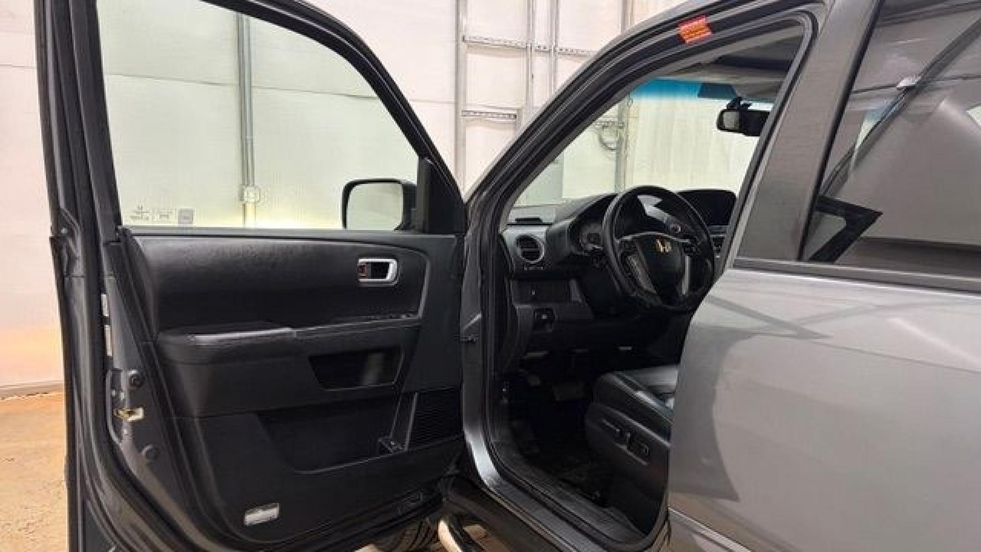 2012 Gray Honda Pilot EX-L (5FNYF3H52CB) with an 3.5L V-6 i-VTEC VCM variable valve control engine, located at 1806 Veterans Memorial Hwy SW, Austell, GA, 30168, (770) 944-9558, 33.817959, -84.606987- Photo#10
