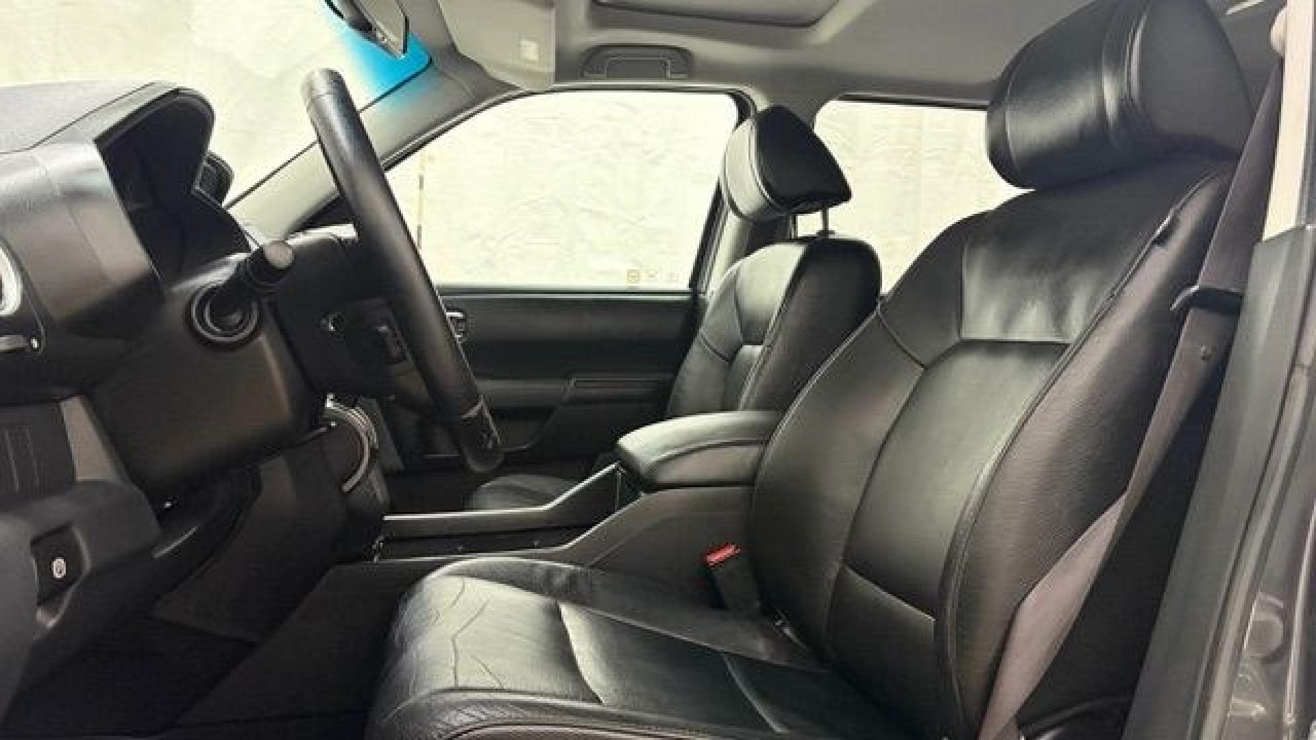 2012 Gray Honda Pilot EX-L (5FNYF3H52CB) with an 3.5L V-6 i-VTEC VCM variable valve control engine, located at 1806 Veterans Memorial Hwy SW, Austell, GA, 30168, (770) 944-9558, 33.817959, -84.606987- Photo#11