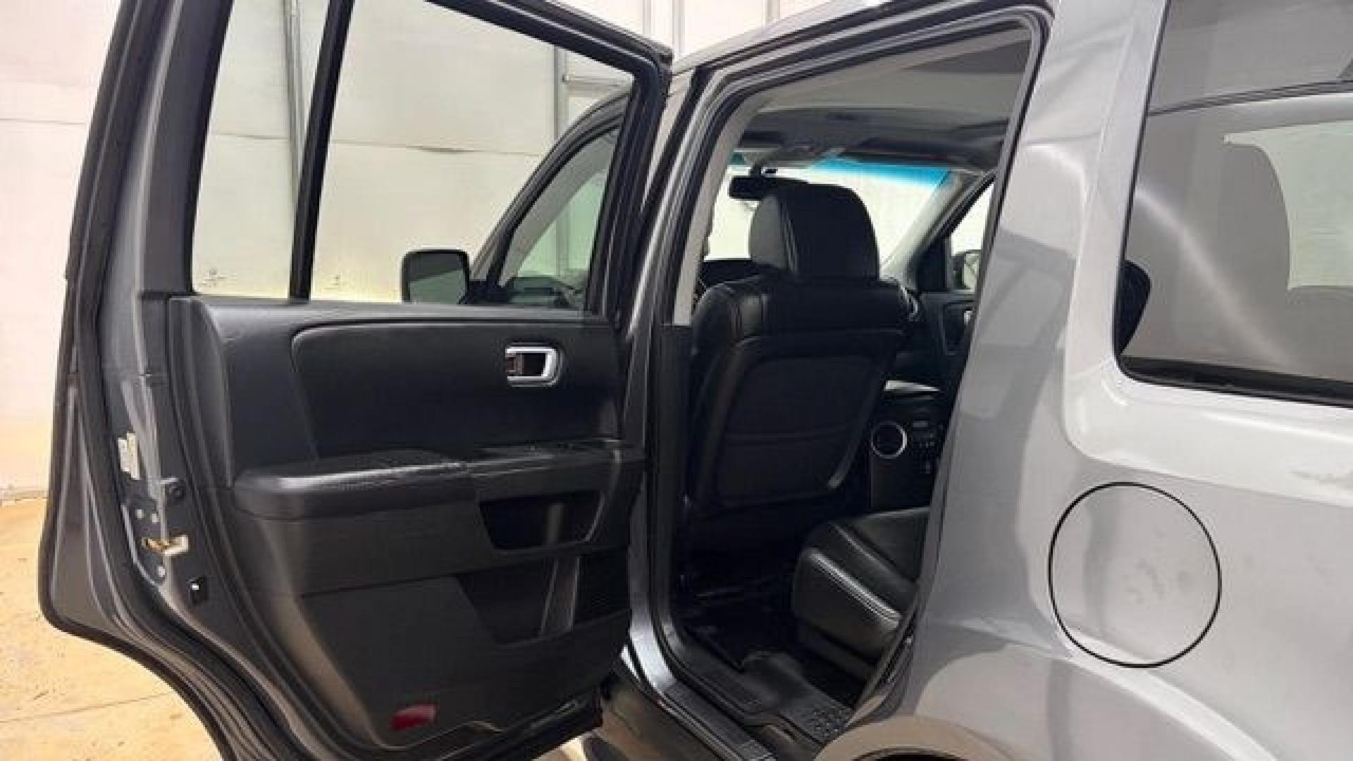 2012 Gray Honda Pilot EX-L (5FNYF3H52CB) with an 3.5L V-6 i-VTEC VCM variable valve control engine, located at 1806 Veterans Memorial Hwy SW, Austell, GA, 30168, (770) 944-9558, 33.817959, -84.606987- Photo#13