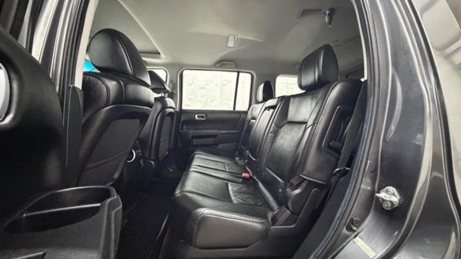 2012 Gray Honda Pilot EX-L (5FNYF3H52CB) with an 3.5L V-6 i-VTEC VCM variable valve control engine, located at 1806 Veterans Memorial Hwy SW, Austell, GA, 30168, (770) 944-9558, 33.817959, -84.606987- Photo#14