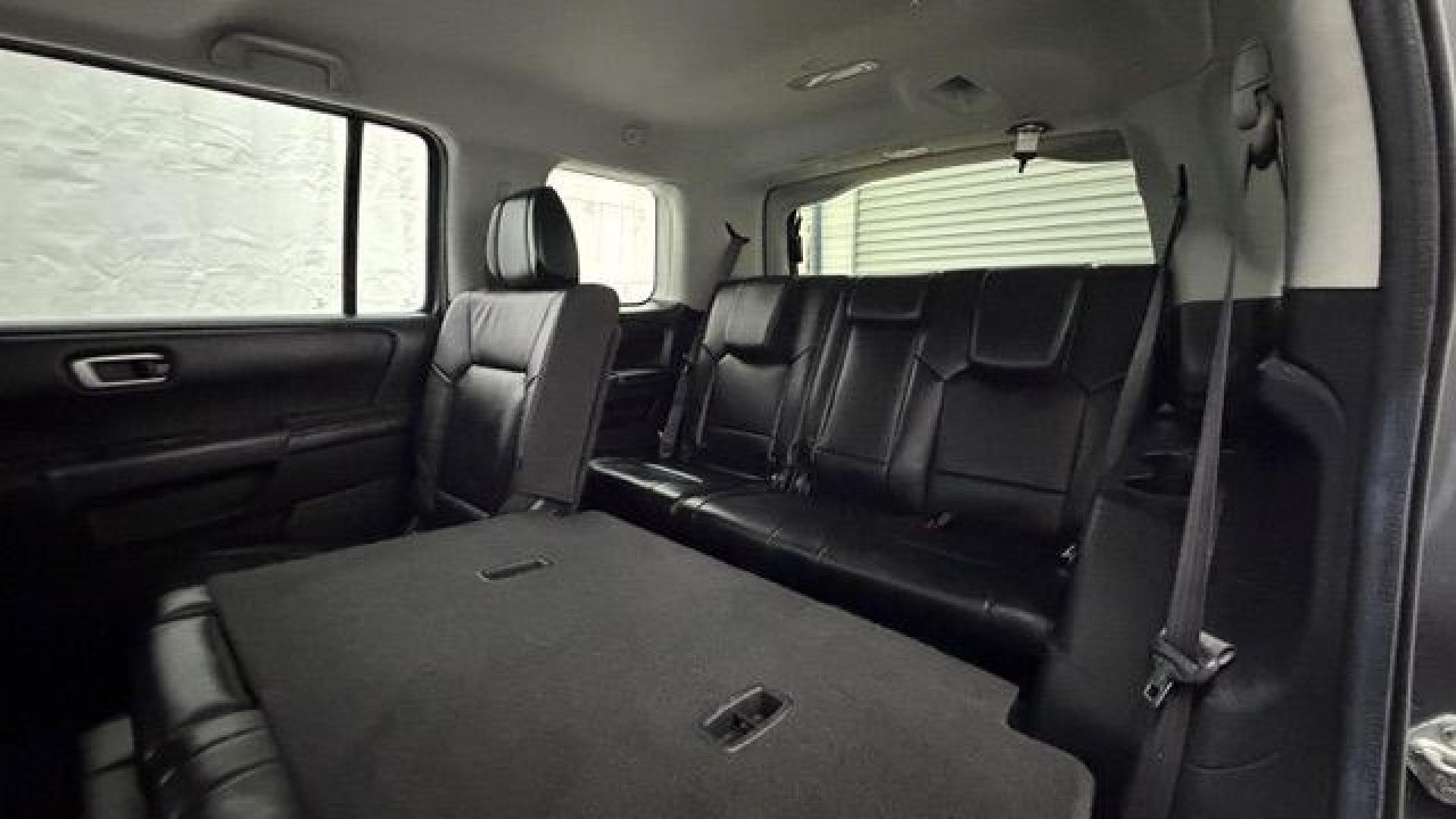 2012 Gray Honda Pilot EX-L (5FNYF3H52CB) with an 3.5L V-6 i-VTEC VCM variable valve control engine, located at 1806 Veterans Memorial Hwy SW, Austell, GA, 30168, (770) 944-9558, 33.817959, -84.606987- Photo#15