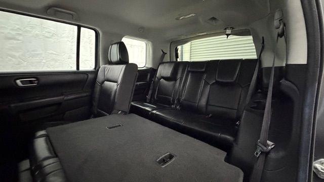 2012 Gray Honda Pilot EX-L (5FNYF3H52CB) with an 3.5L V-6 i-VTEC VCM variable valve control engine, located at 1806 Veterans Memorial Hwy SW, Austell, GA, 30168, (770) 944-9558, 33.817959, -84.606987 - Photo#15