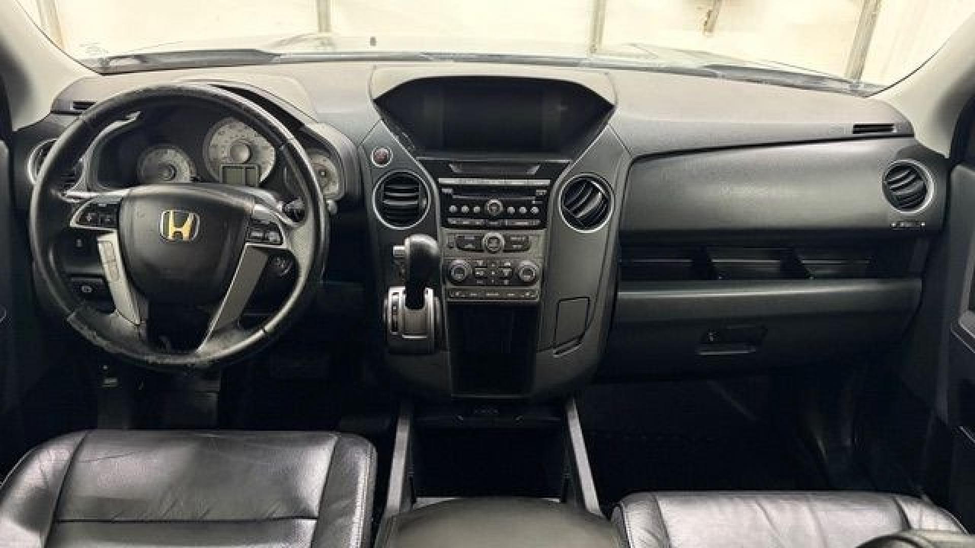 2012 Gray Honda Pilot EX-L (5FNYF3H52CB) with an 3.5L V-6 i-VTEC VCM variable valve control engine, located at 1806 Veterans Memorial Hwy SW, Austell, GA, 30168, (770) 944-9558, 33.817959, -84.606987- Photo#16