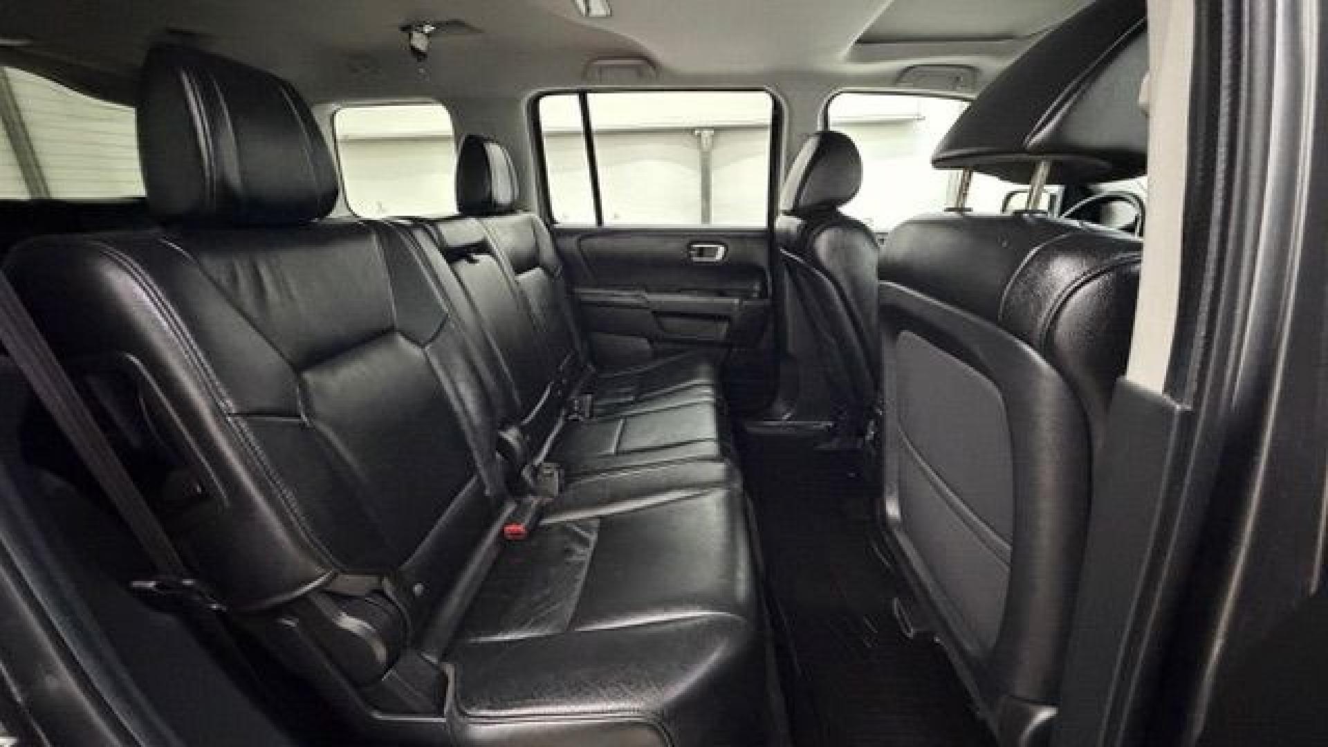 2012 Gray Honda Pilot EX-L (5FNYF3H52CB) with an 3.5L V-6 i-VTEC VCM variable valve control engine, located at 1806 Veterans Memorial Hwy SW, Austell, GA, 30168, (770) 944-9558, 33.817959, -84.606987- Photo#18