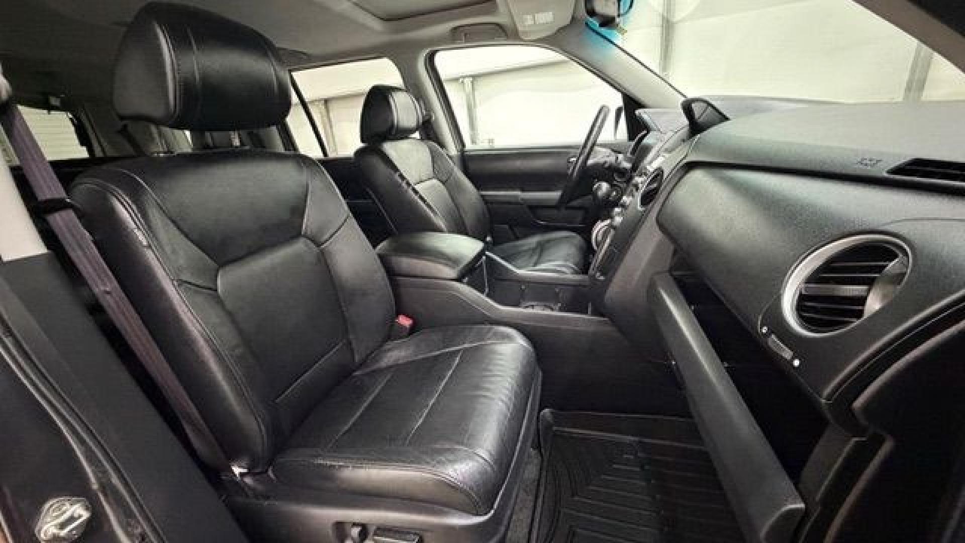 2012 Gray Honda Pilot EX-L (5FNYF3H52CB) with an 3.5L V-6 i-VTEC VCM variable valve control engine, located at 1806 Veterans Memorial Hwy SW, Austell, GA, 30168, (770) 944-9558, 33.817959, -84.606987- Photo#19