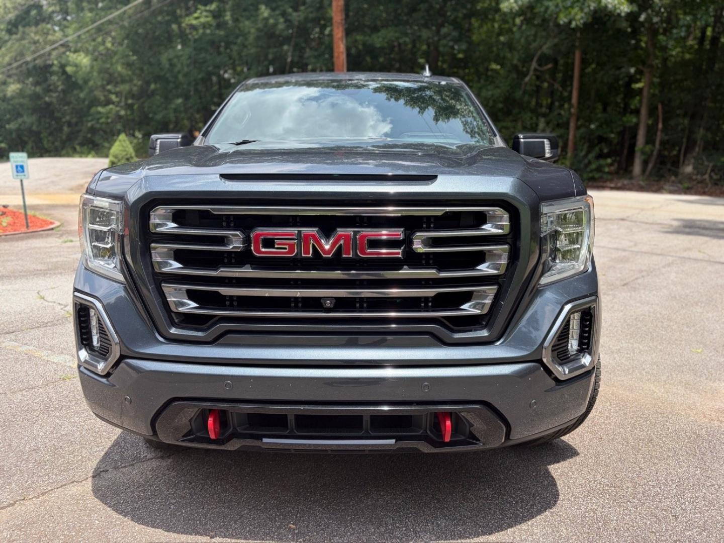 2020 Gray GMC Sierra 1500 4WD Crew Cab Short Box AT4 (3GTU9EET3LG) with an Duramax 3L I-6 diesel direct injection engine, located at 1806 Veterans Memorial Hwy SW, Austell, GA, 30168, (770) 944-9558, 33.817959, -84.606987- Photo#2