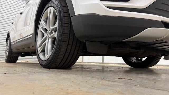 2015 White Lincoln MKC Base (5LMTJ2AH0FU) , located at 1806 Veterans Memorial Hwy SW, Austell, GA, 30168, (770) 944-9558, 33.817959, -84.606987 - Photo#19