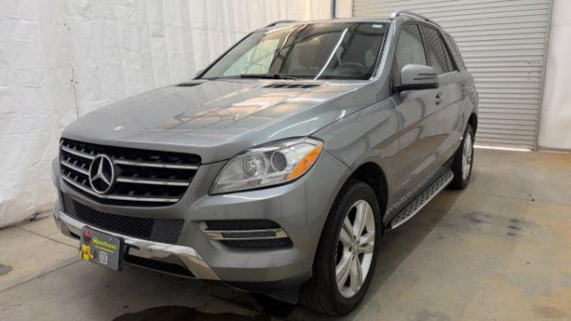 2015 Silver Mercedes-Benz ML 350 Class (4JGDA5JB3FA) , located at 1806 Veterans Memorial Hwy SW, Austell, GA, 30168, (770) 944-9558, 33.817959, -84.606987 - Photo#0